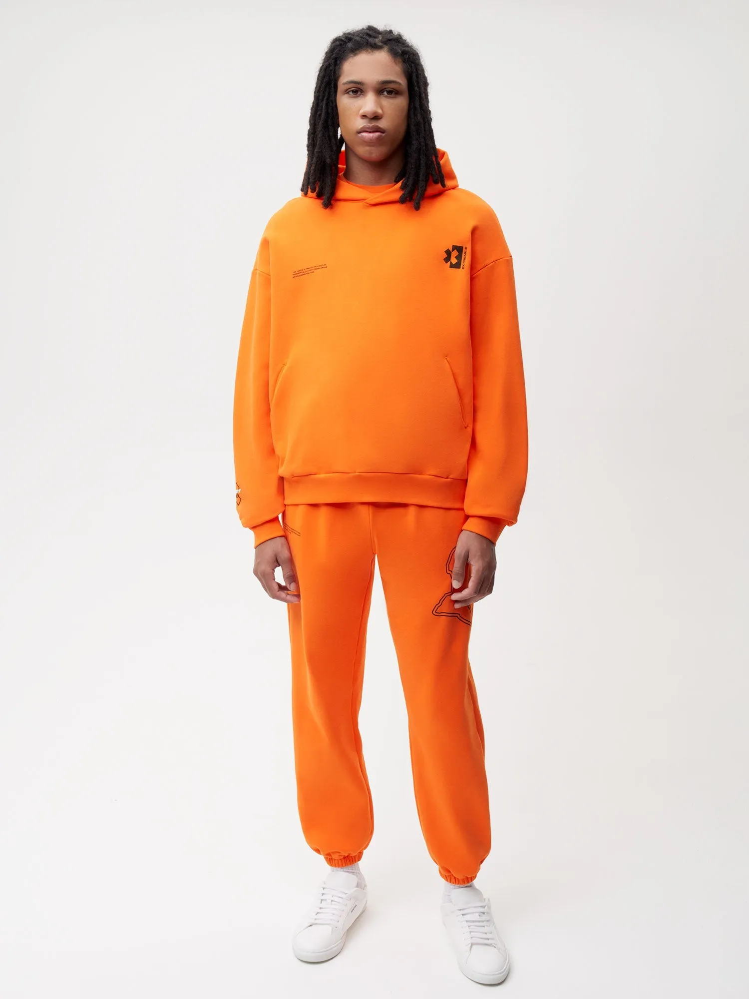 PANGAIA x Extreme-E Track Pants—persimmon orange