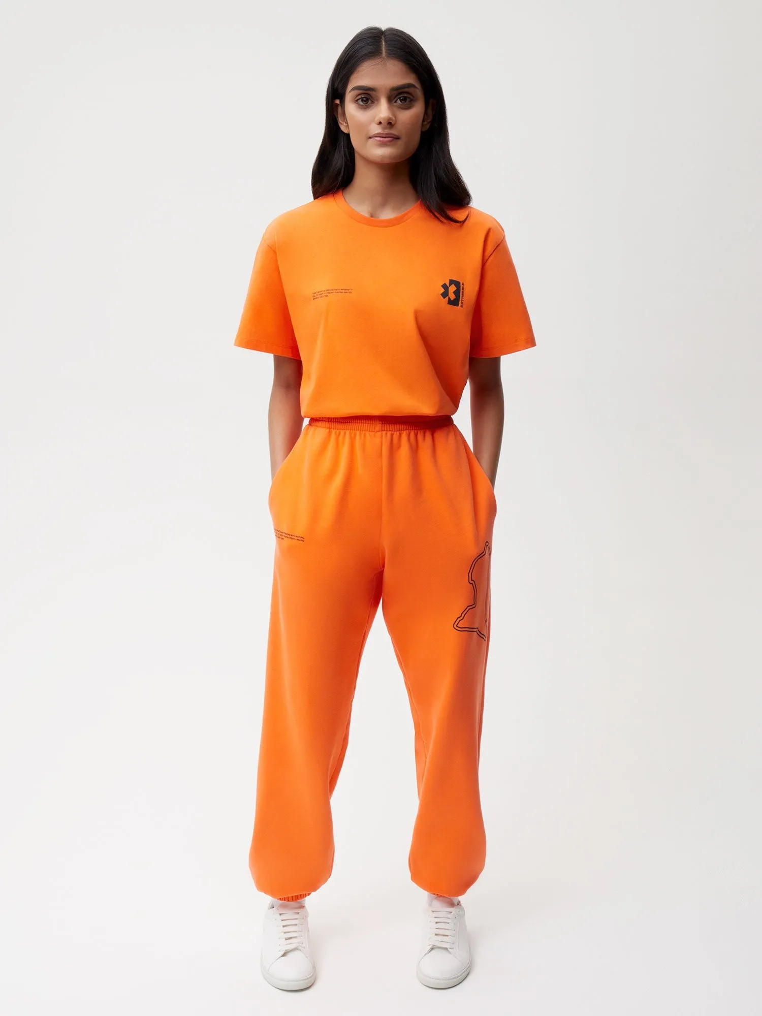 PANGAIA x Extreme-E Track Pants—persimmon orange