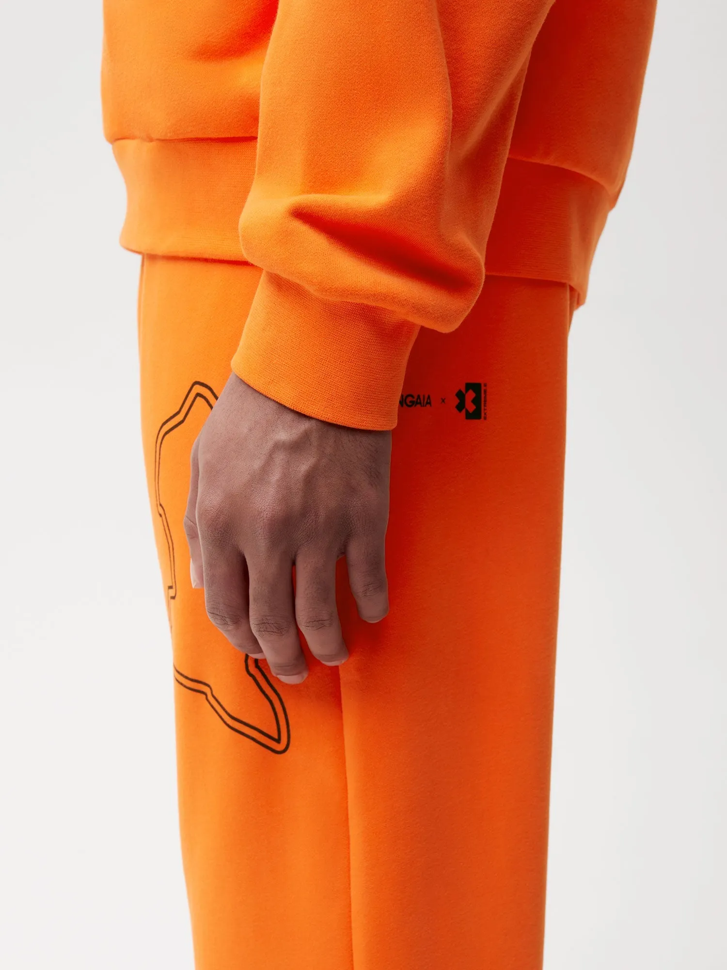 PANGAIA x Extreme-E Track Pants—persimmon orange